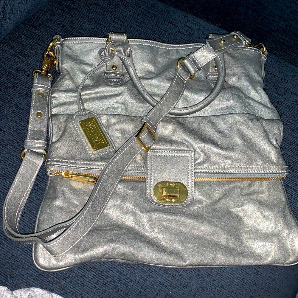 Metallic silver Badgley Mischka purse.